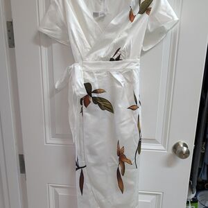 Elegant White Wrap Dress with Floral Accents